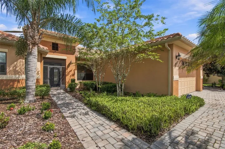 Custom Landscaping and screened front entryway