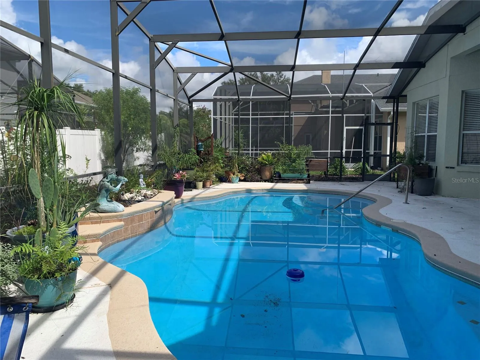SCREENED AND  SOLAR HEATED POOL
