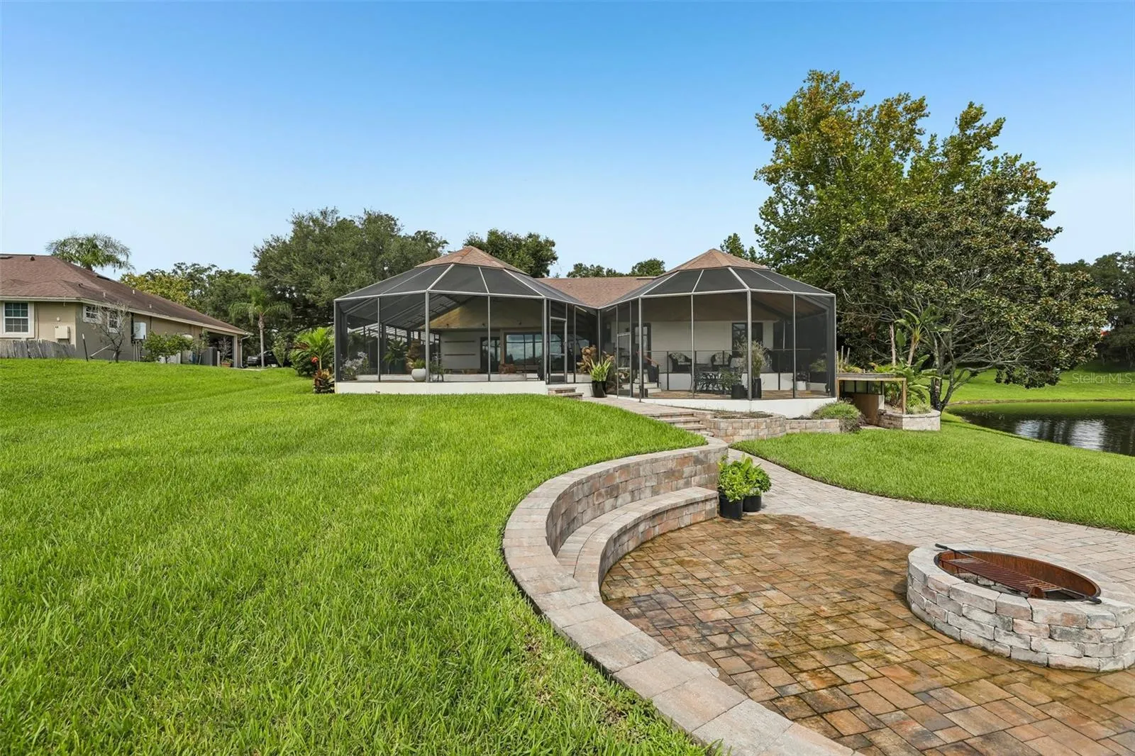 View of the back yard and fire pit.
