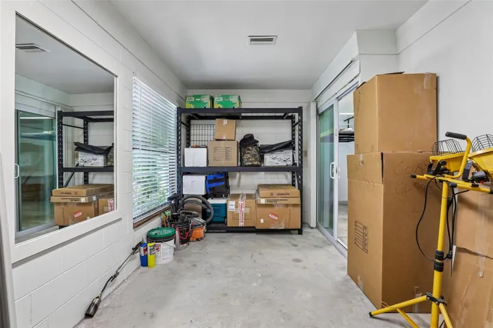 Climate controlled bonus area off of garage.  Perfect for craft/hobby/office/storage.