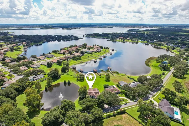 Surrounded by Johns Lake and the community pond.