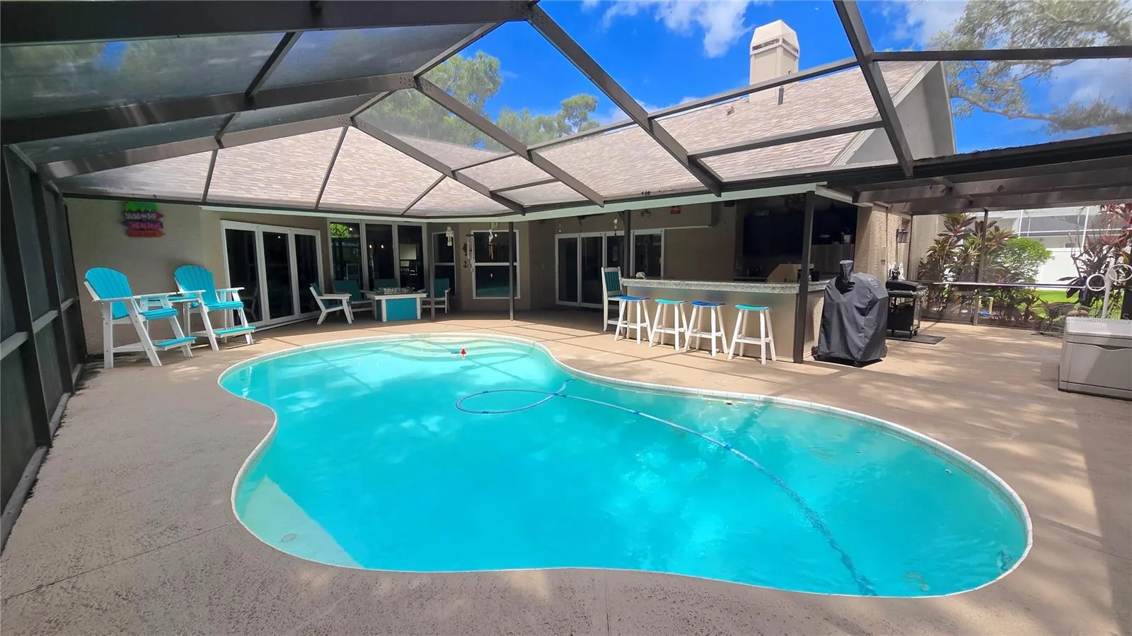 Entertainment galore right here around the pool, bar under the screened patio lanai.  This right here is what Florida is all about.  Now make this yours!