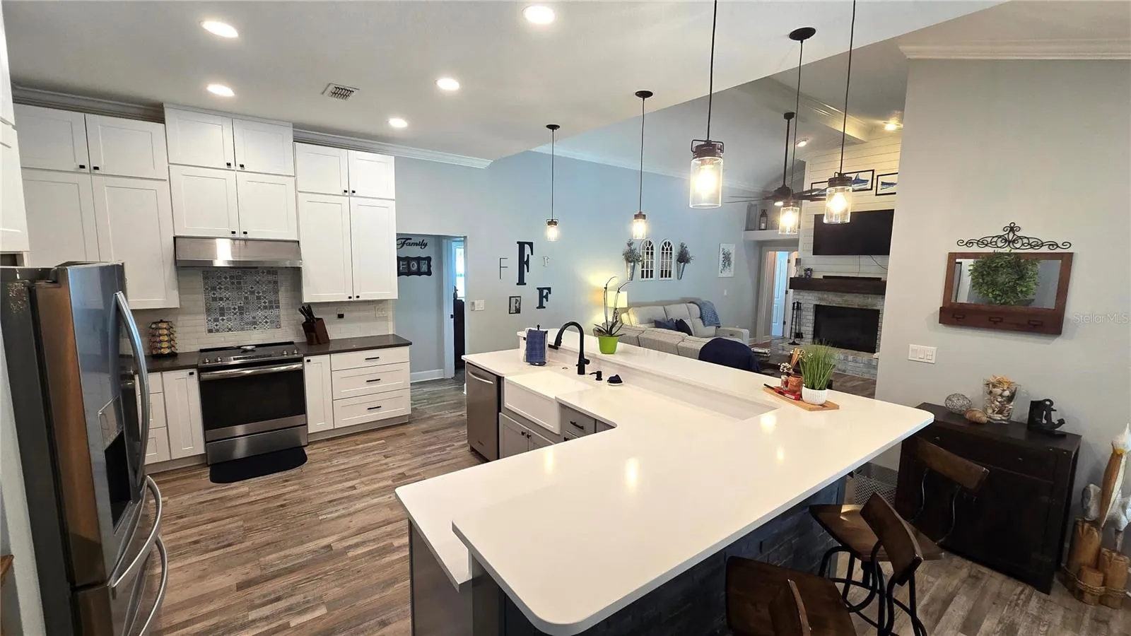 No shortage of cabinets space in this beautiful kitchen.