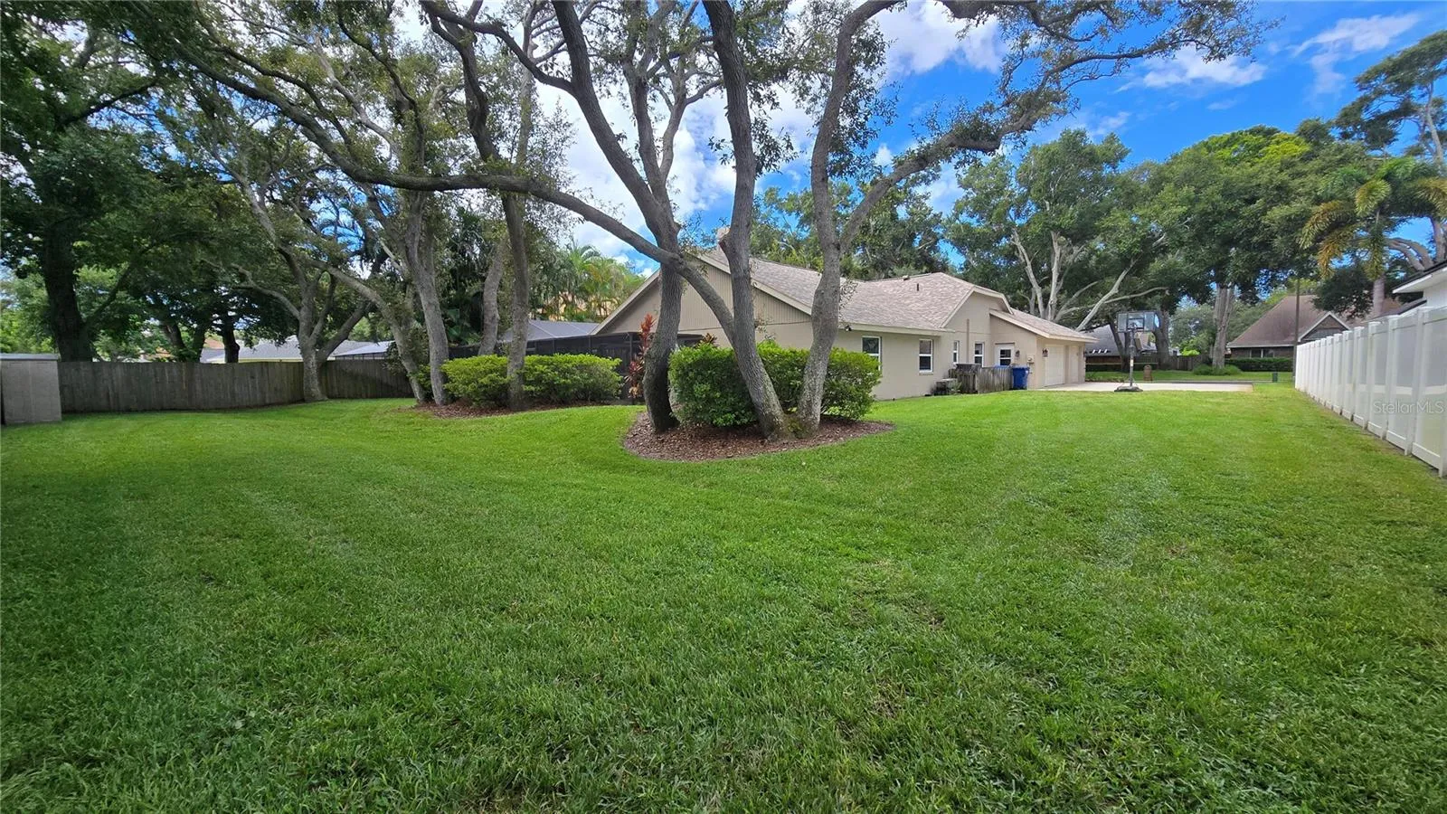 Huge lot with 0.39 acres with plenty of shade trees and a well groomed yard.
