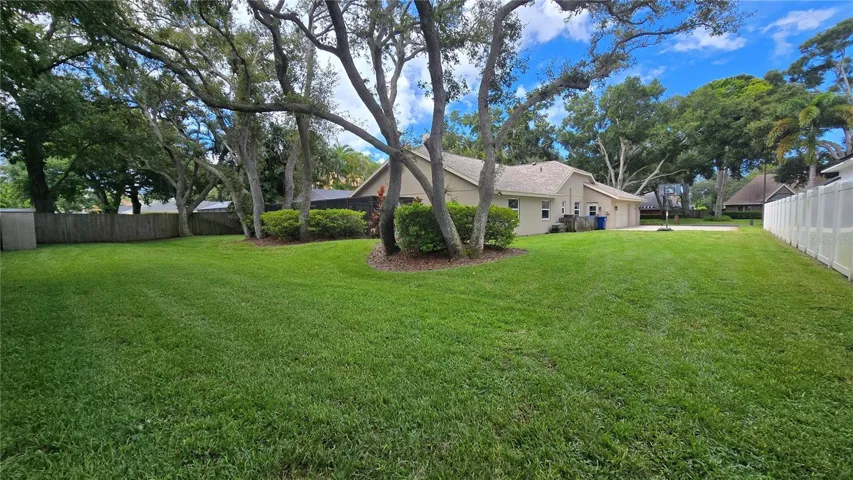 Huge lot with 0.39 acres with plenty of shade trees and a well groomed yard.