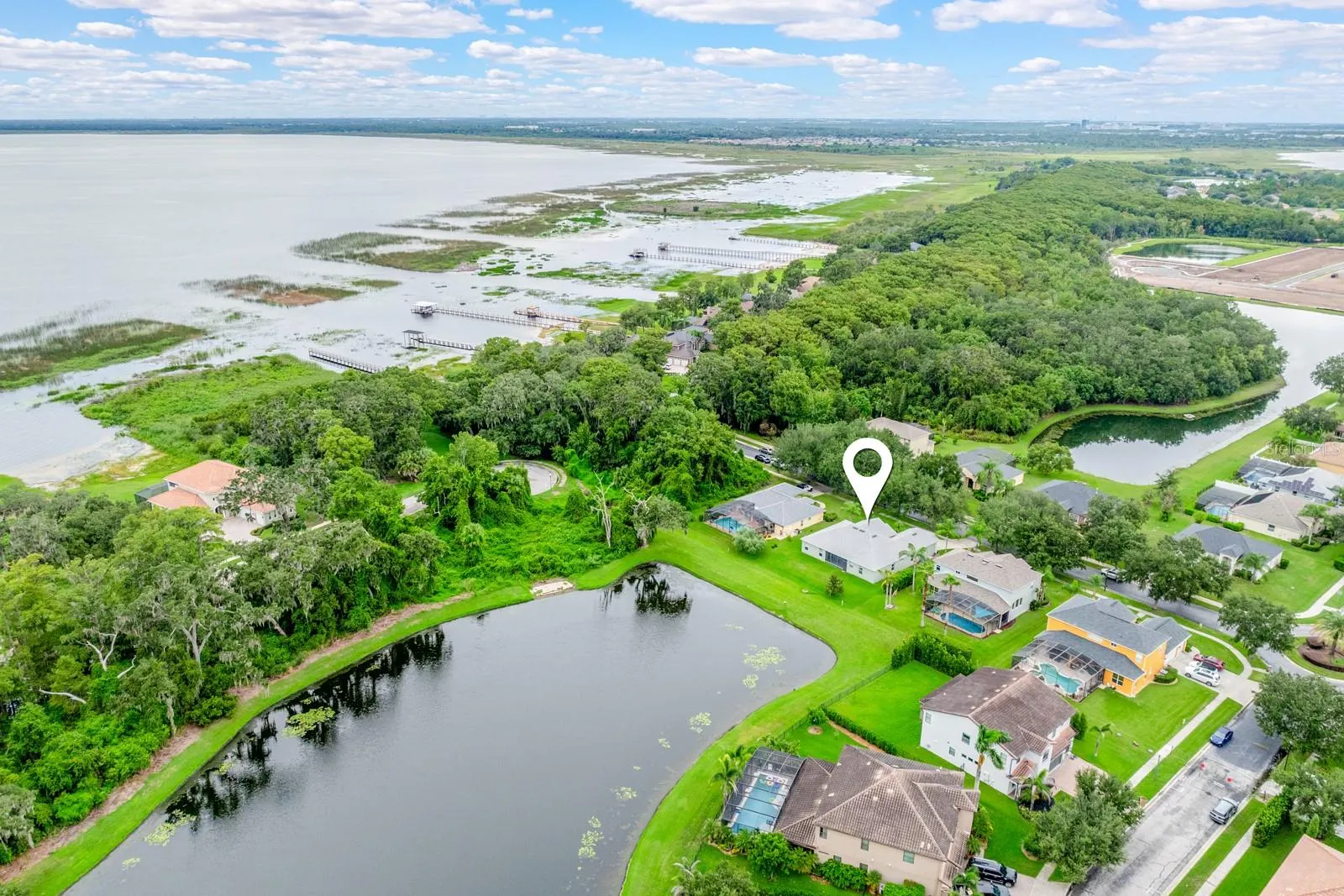 In the perfect location to enjoy a water view and live the lake life!