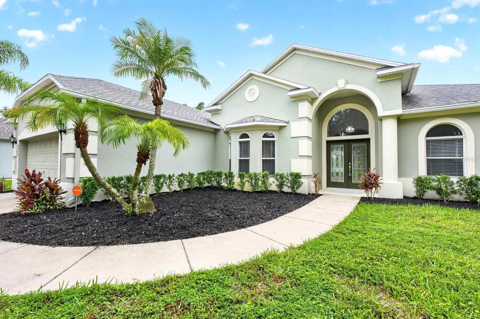 Manicured front entry for excelled curb appeal.