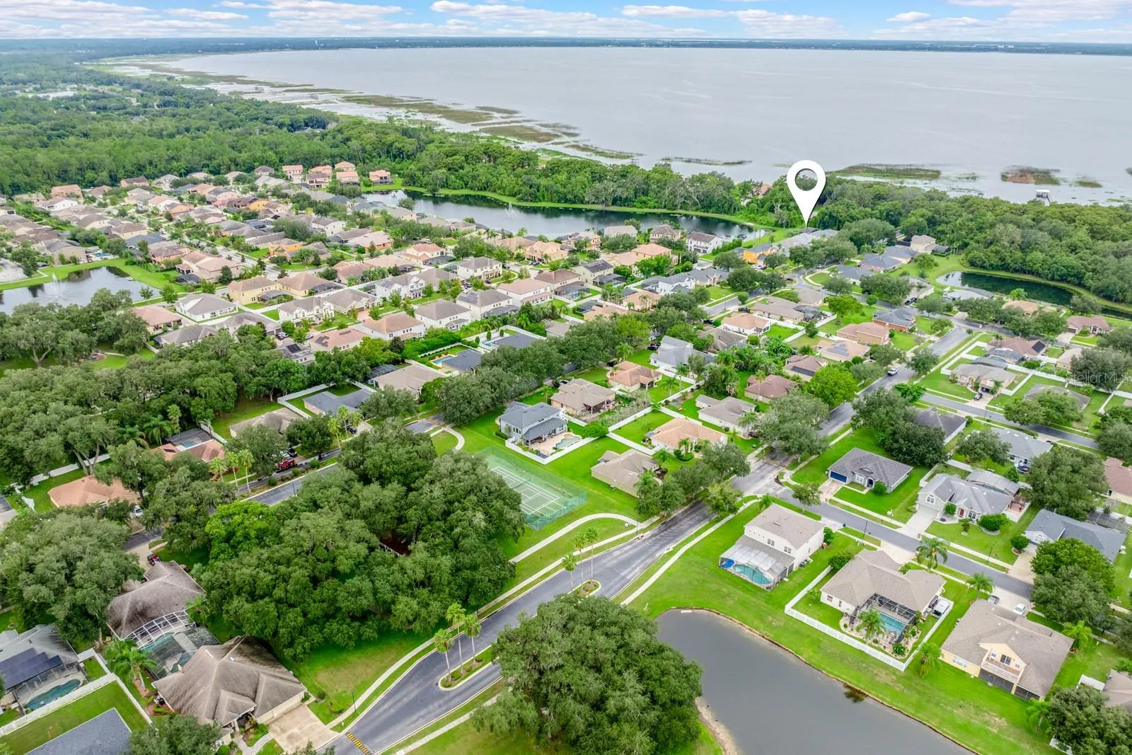 East Lake Toho shimmers as the backdrop to this community.