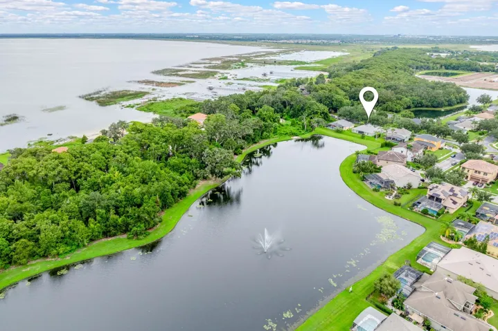 Premium pond lot with East Lake Toho in the background.