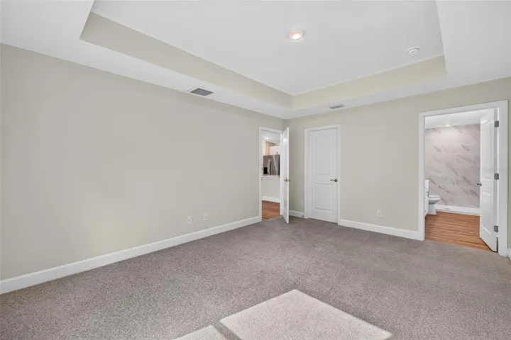 Tray ceiling in Primary bedroom