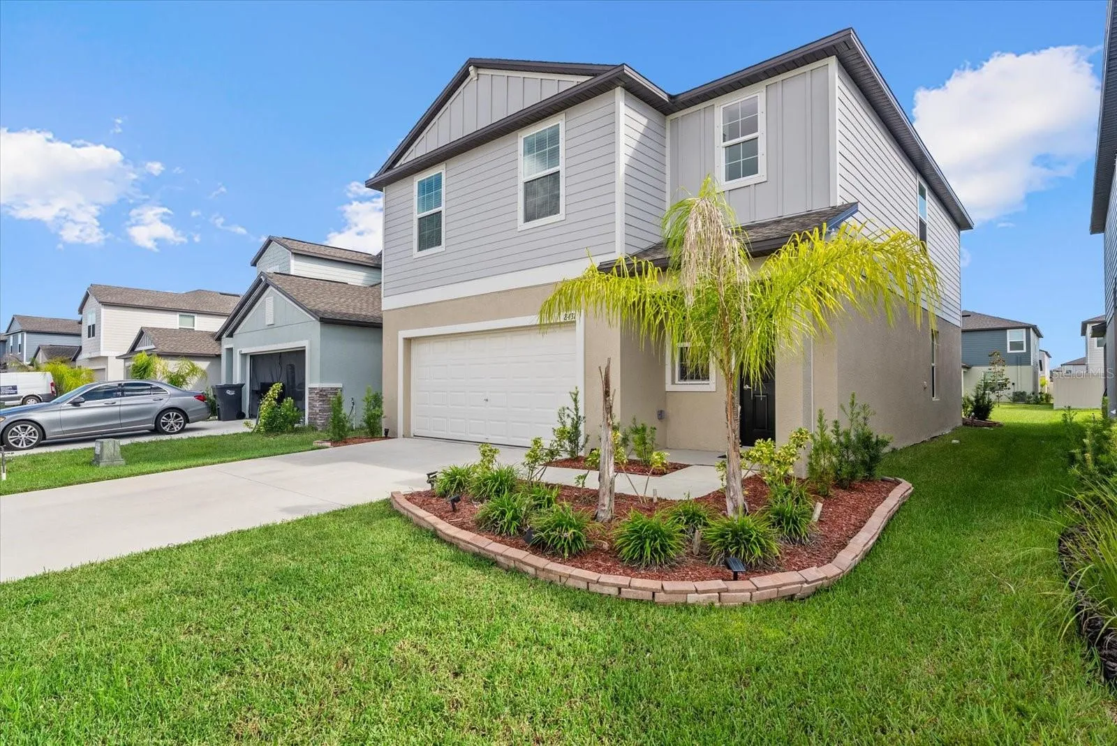 Attractive two-story exterior with an attached two-car garage.