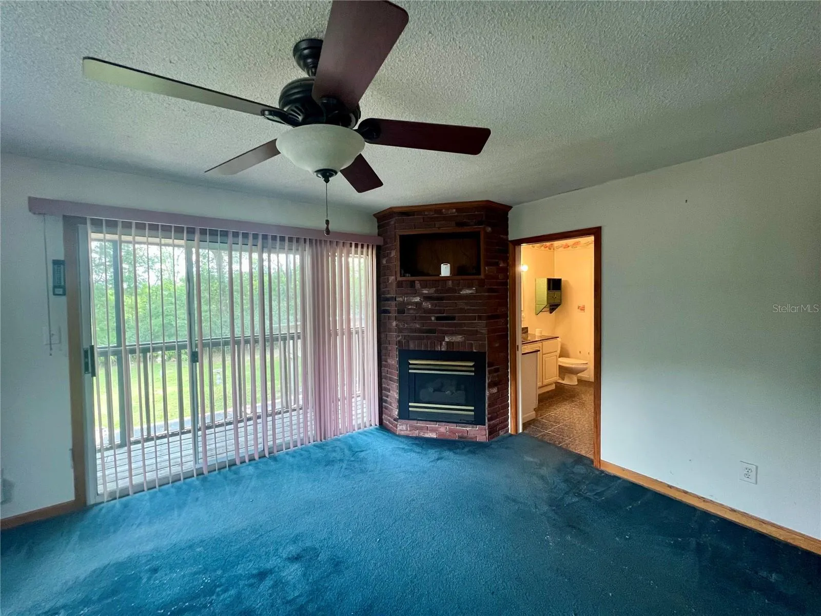 Primary upstairs bedroom w/ fireplace