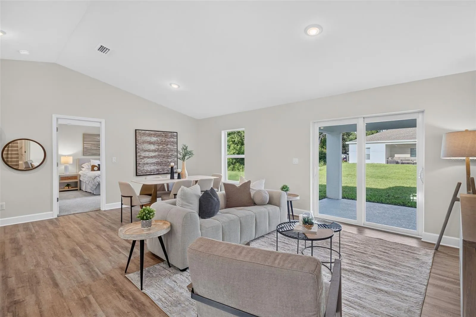 Staged Livingroom/diningroom with Luxury Vinyl Floors