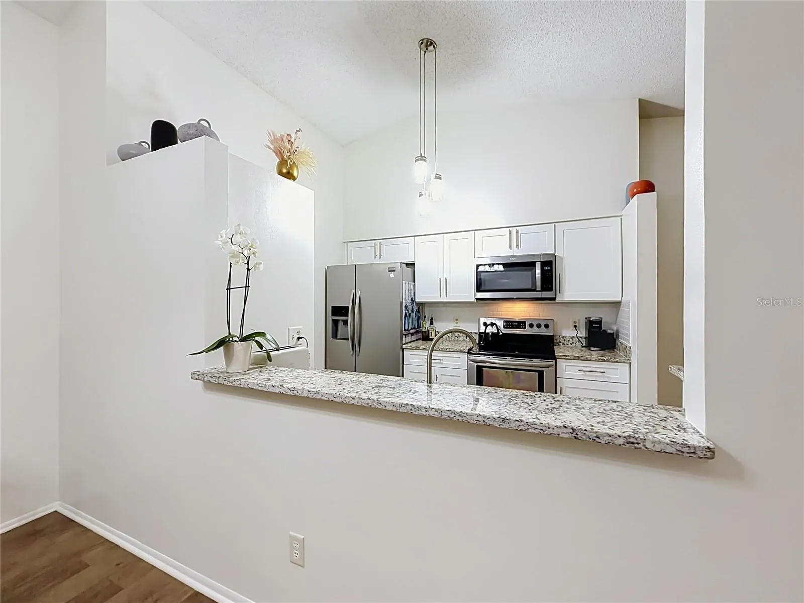 Showing Kitchen open to Dining area.