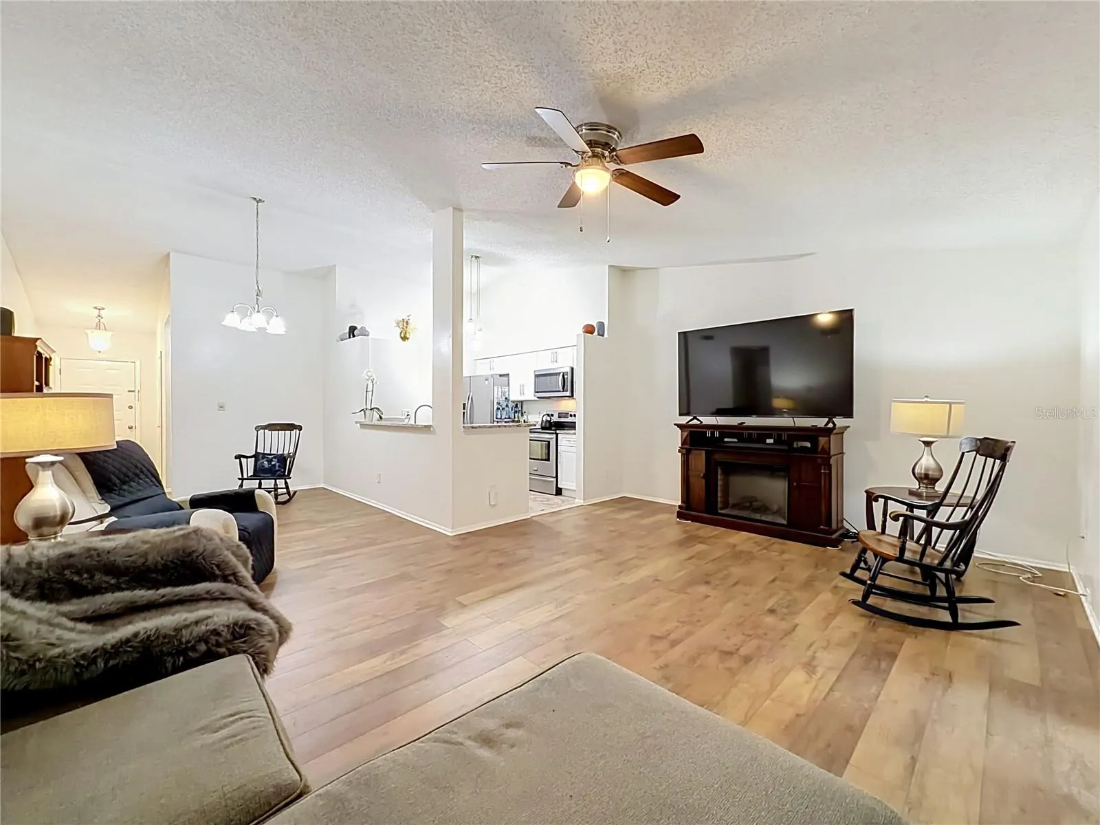 Open floor plan. Beautiful laminate flooring in all areas except kitchen and baths.