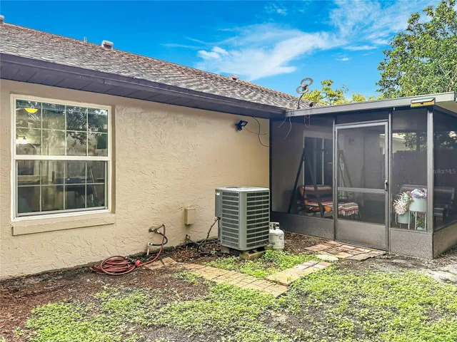 Enclosed, private yard has room to garden.