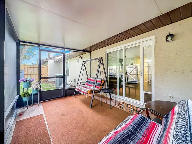 Covered and Screened Back Porch.