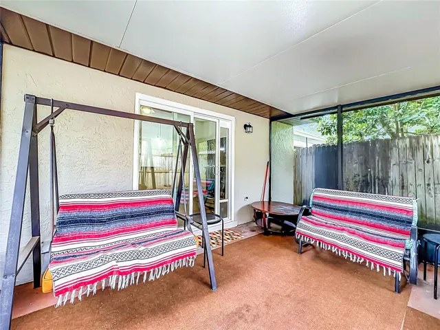 Covered and Screened Porch, fenced for complete privacy.