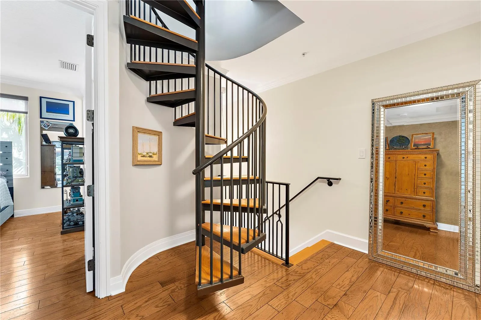 Spiral staircase to 4th level (elevator option as well)