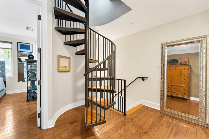 Spiral staircase to 4th level (elevator option as well)