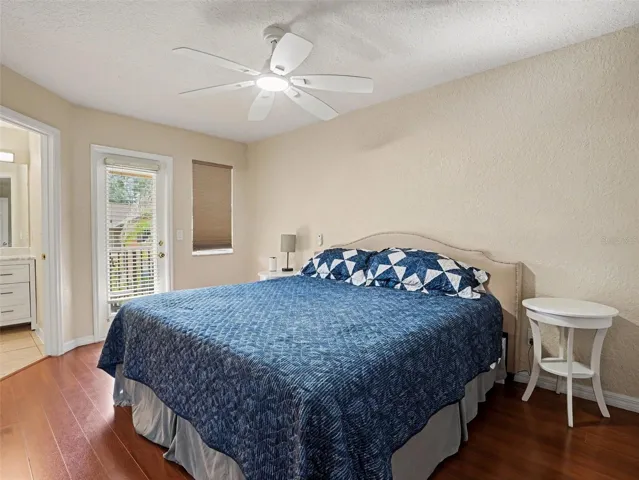 Primary Bedroom w/ balconny