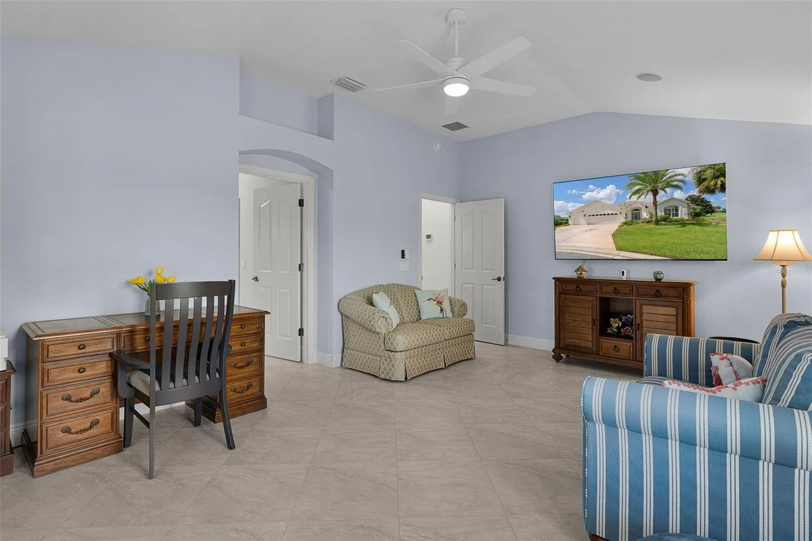 2nd primary bedroom with its own full master bathroom and huge walk-in closetpocket doors open/currently used as an office