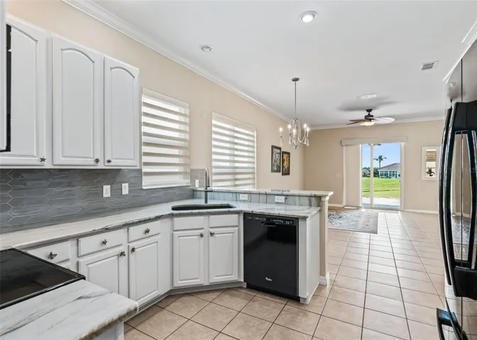 Kitchen flows to family rm