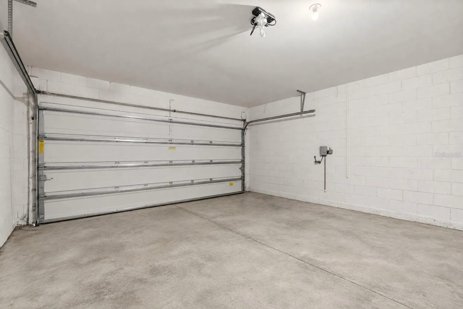 2-car garage with additional storage potential.
