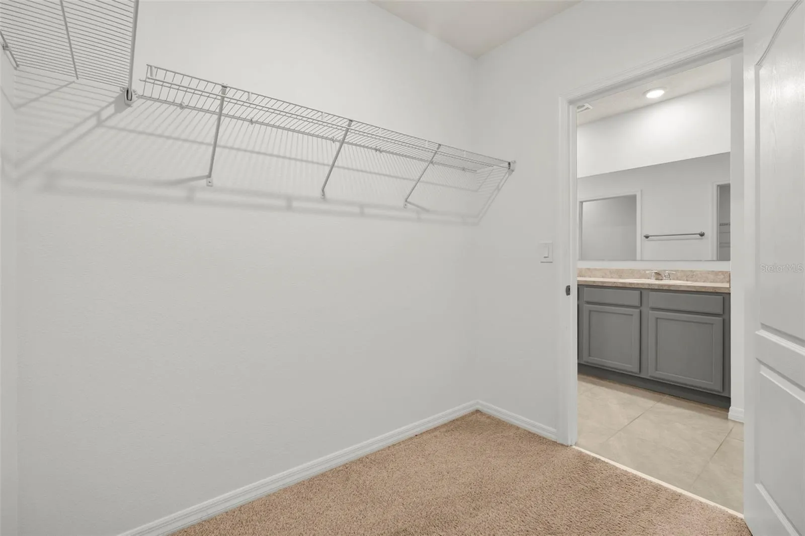 Generous walk-in closet offering plenty of storage space.