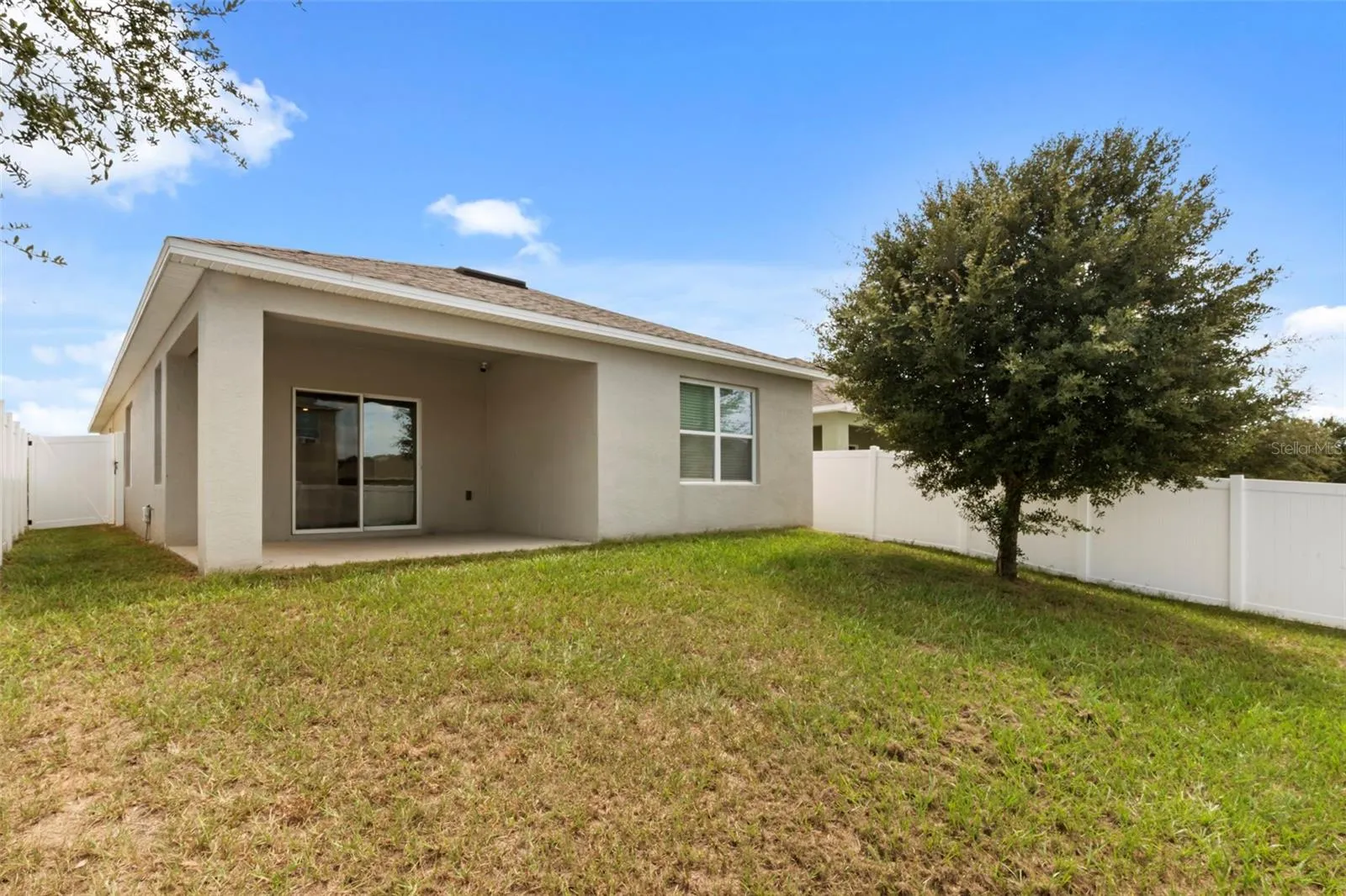 Spacious backyard with room to relax, entertain, or create your own outdoor retreat.