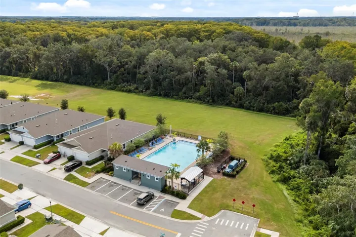 Aerial view of the community pool and surrounding recreation area.