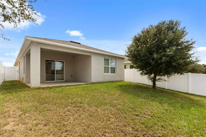 Spacious backyard with room to relax, entertain, or create your own outdoor retreat.