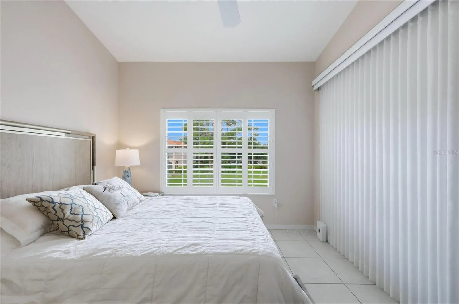 Curtaind and Plantation Shutters regulate as much sun light as one wants.