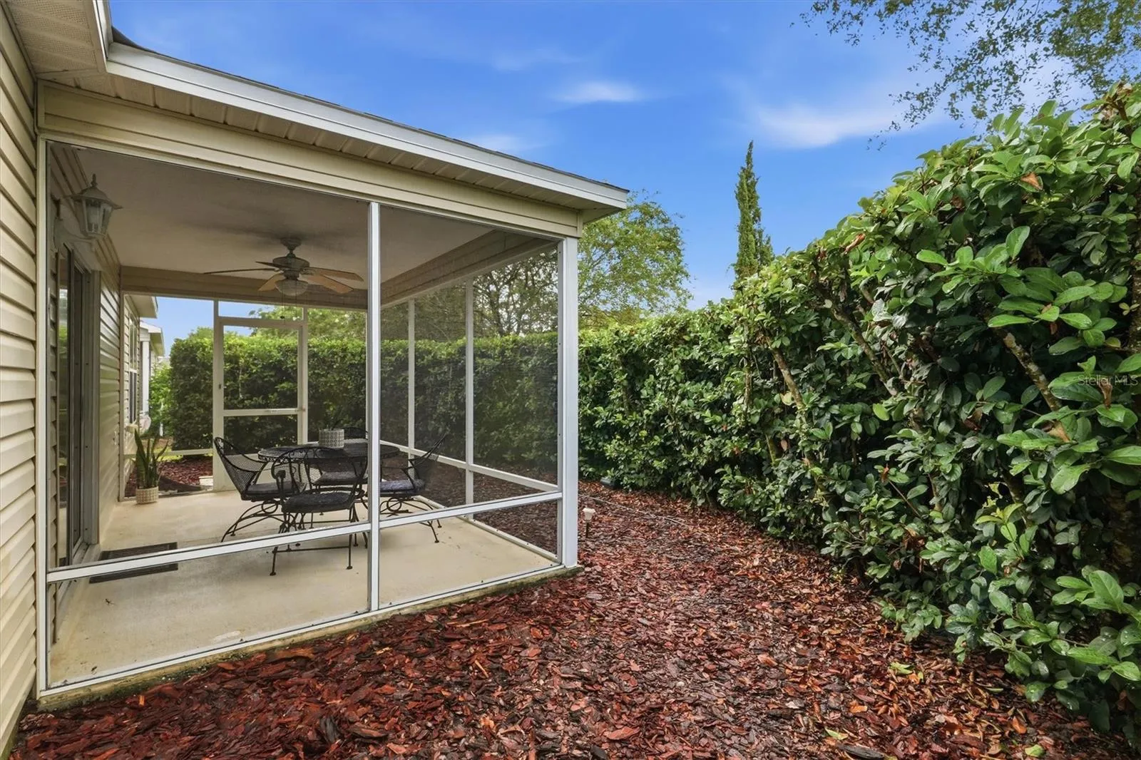 Lanai: "Private east-facing screened lanai for morning coffee and evening entertaining"