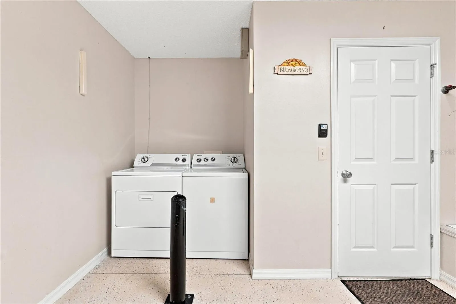 Garage: "One-car and golf-cart garage, Village of Summerhill home"
