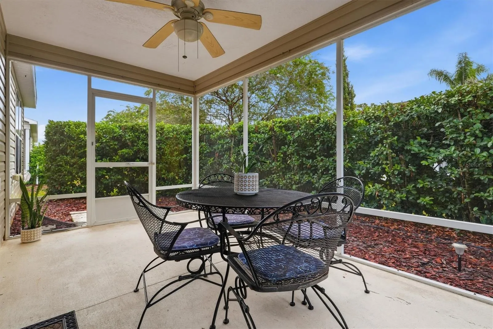 Lanai: "Private east-facing screened lanai for morning coffee and evening entertaining"