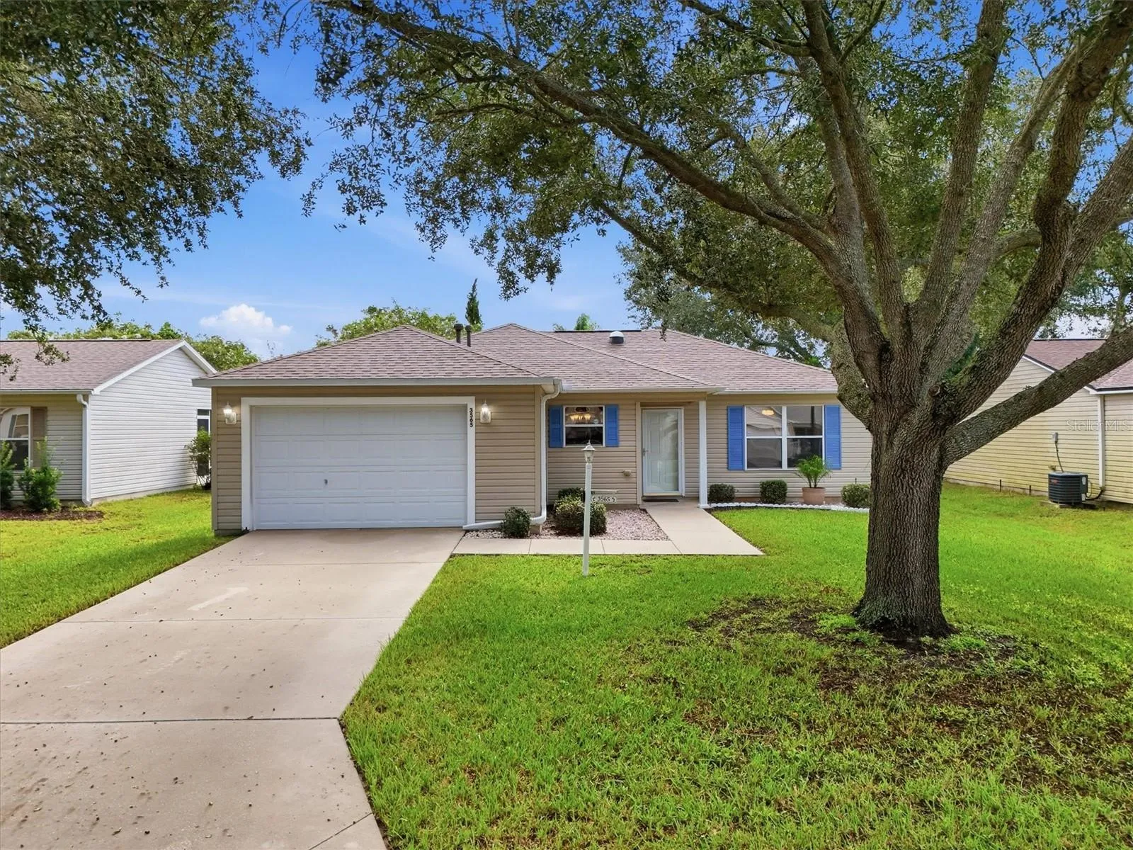 Front exterior:3565 Idlewood Loop exterior – Corpus Christi model home in Village of Summerhill, The Villages FL 32162