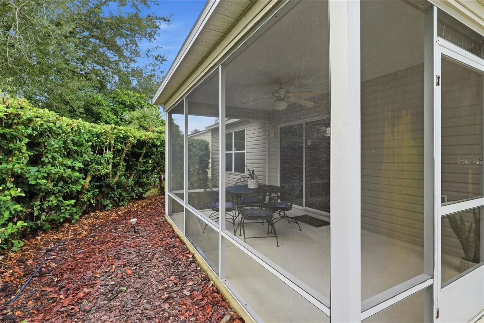 Lanai: "Private east-facing screened lanai for morning coffee and evening entertaining"