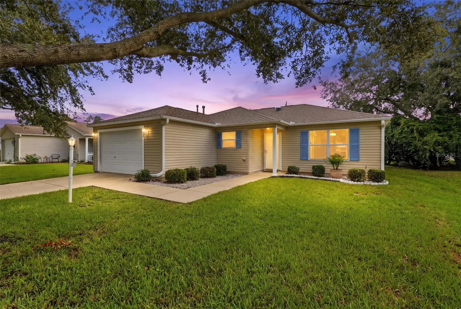 Front exterior:3565 Idlewood Loop exterior – Corpus Christi model home in Village of Summerhill, The Villages FL 32162