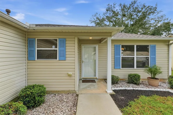 Front exterior:3565 Idlewood Loop exterior – Corpus Christi model home in Village of Summerhill, The Villages FL 32162