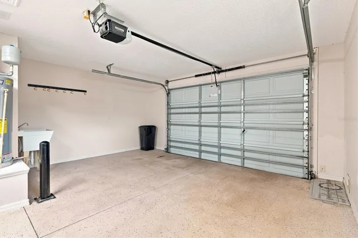 Garage: "One-car and golf-cart garage, Village of Summerhill home"