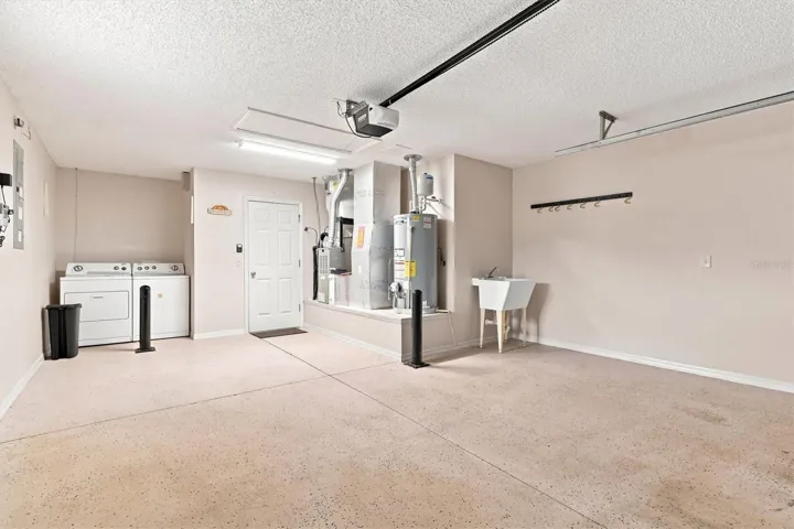 Garage: "One-car and golf-cart garage, Village of Summerhill home"