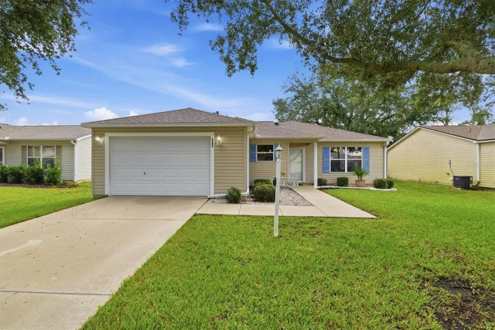 Front exterior:3565 Idlewood Loop exterior – Corpus Christi model home in Village of Summerhill, The Villages FL 32162