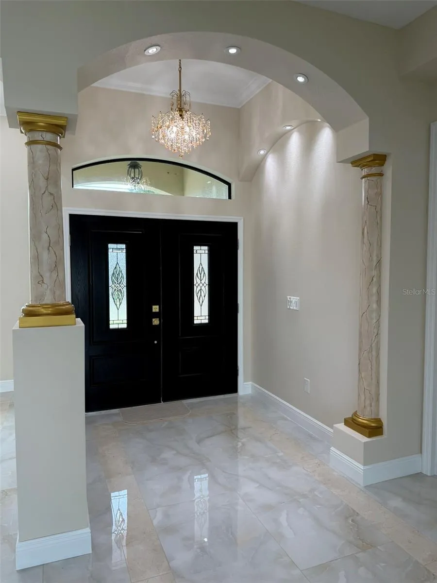Impact  front doors and foyer.