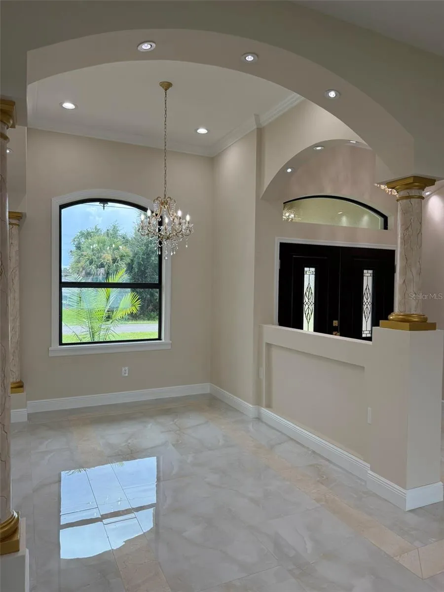 Dining Room and Foyer.   Look at all that lighting!