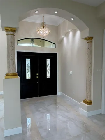 Impact  front doors and foyer.