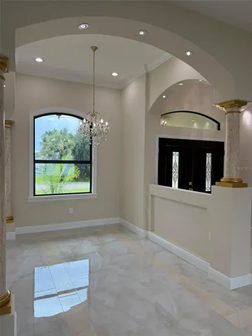 Dining Room and Foyer.   Look at all that lighting!