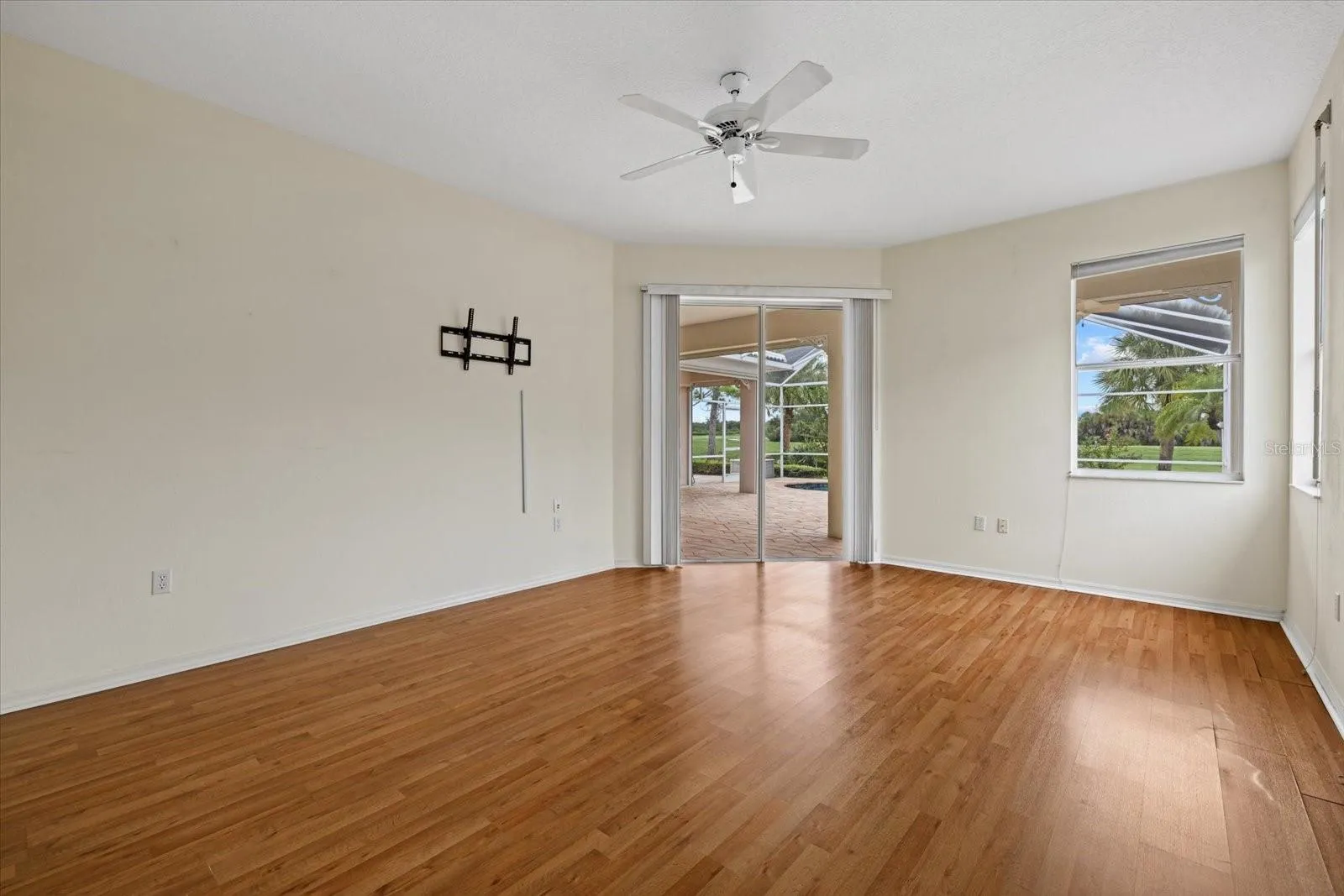 Primary Bedroom Suite with Sliders to the Lanai &amp; Pool