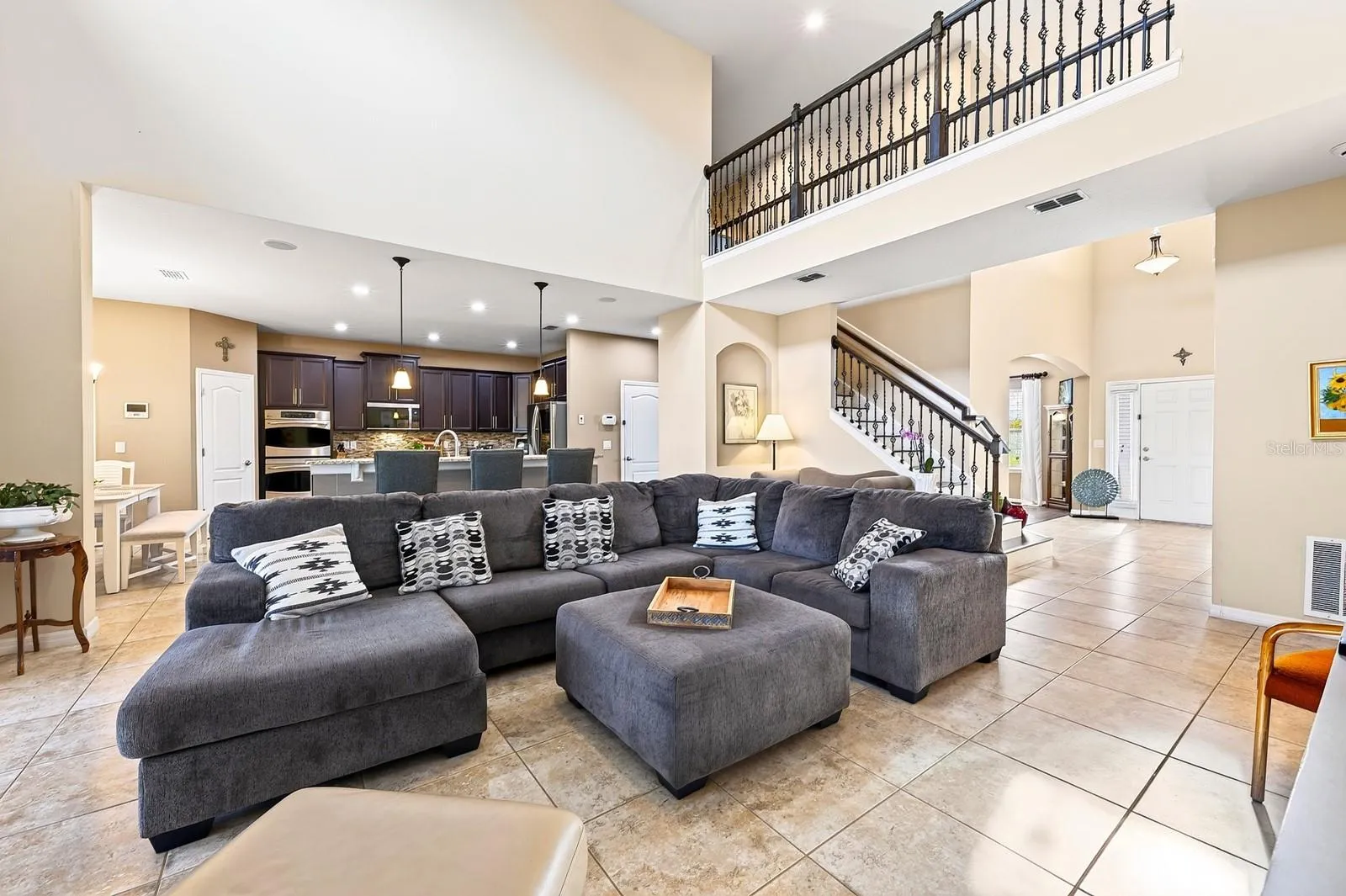 Natural light pours into the two story family room.