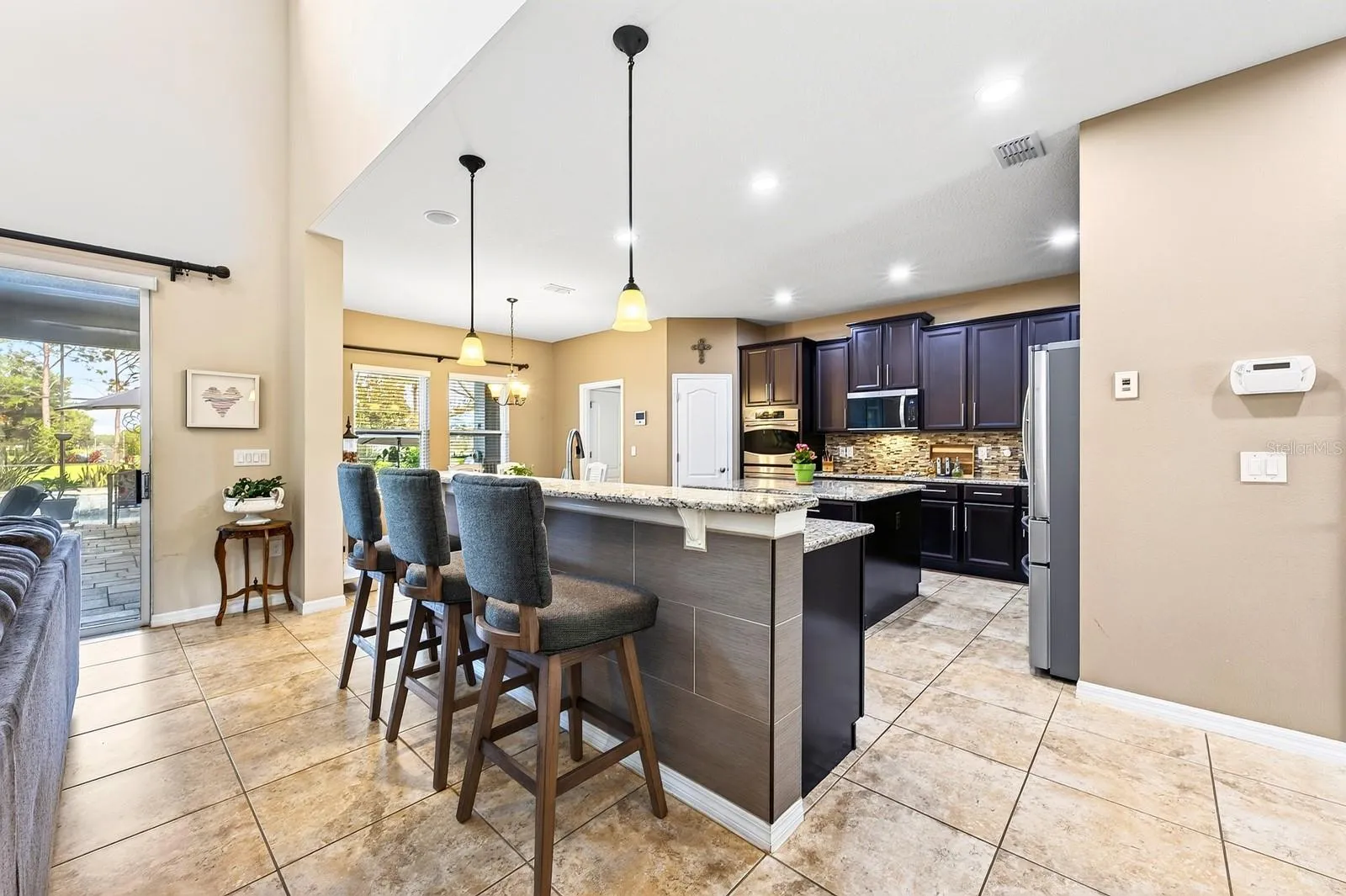 The kitchen truly is the heart of this beautiful home, gather with family or entertain friends.